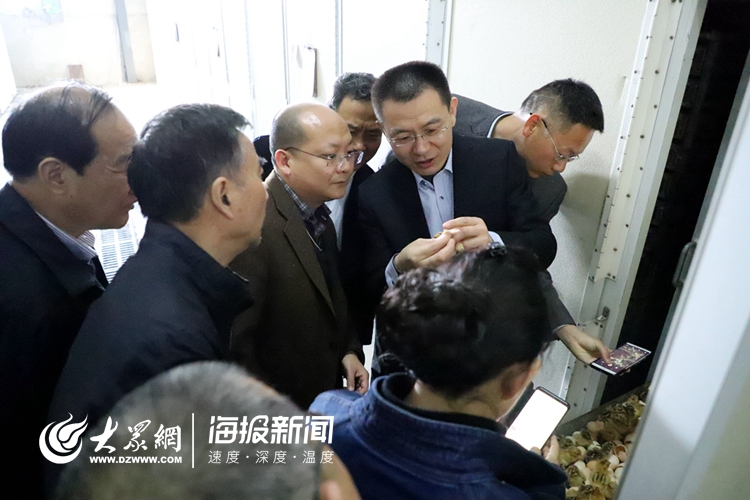莒县人民政府党组成员吴锡华,莒县畜牧兽医局负责人唐修晓及相关工作